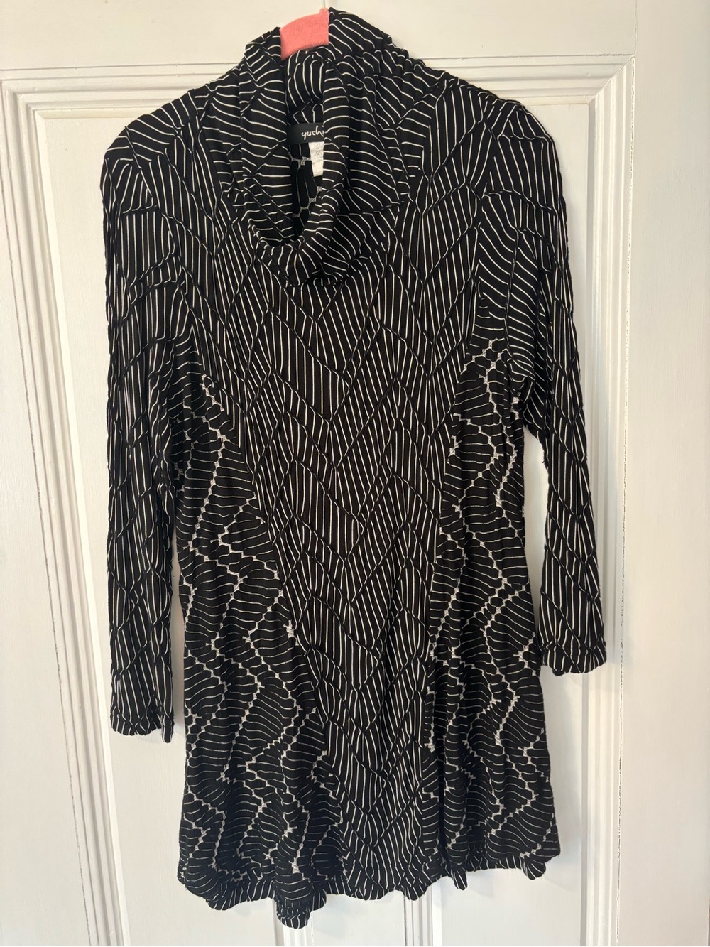 Yushi Black Tunic with White geometric design.